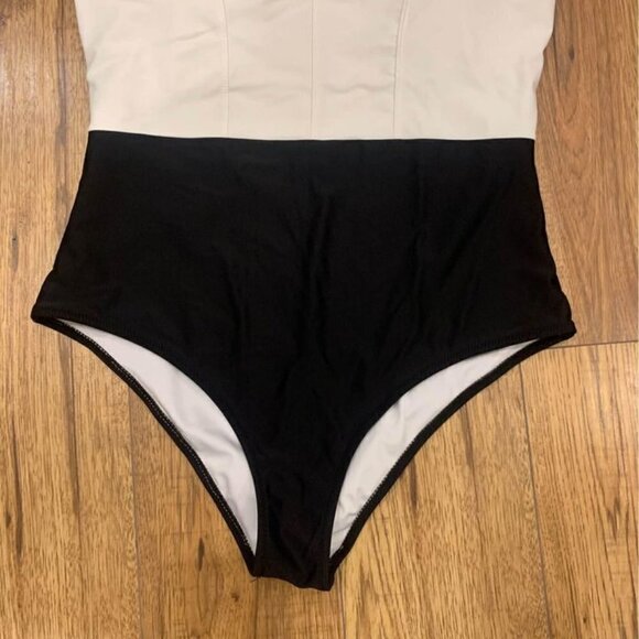 WOMAN’S one piece swimsuit. Black and white. Racerback. White portion is lined. - Picture 3 of 6